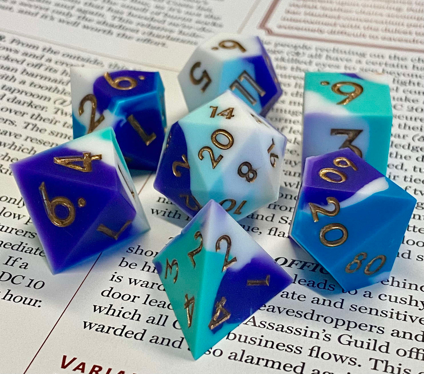 Telekinesis- New Wave- 7 Piece Marble Silicone Sharp Edge Dice Set-Purple/Blue/White-Bouncy, Squishy, Standard Size- Gold Ink- RPGs, DnD, Pathfinder
