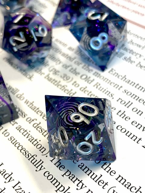 Etherealness - Galactic Style Sharp Edge Dice Set- Tinted Indigo With Spiral Galaxy and Planet Inclusions -Silver Ink -TTRPG Dice, D&D, Pathfinder