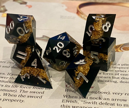Alchemy: Glittering Layered Sharp Edge Dice Set - 7 Piece - Obsidian Black With Gold Glitter Inclusions