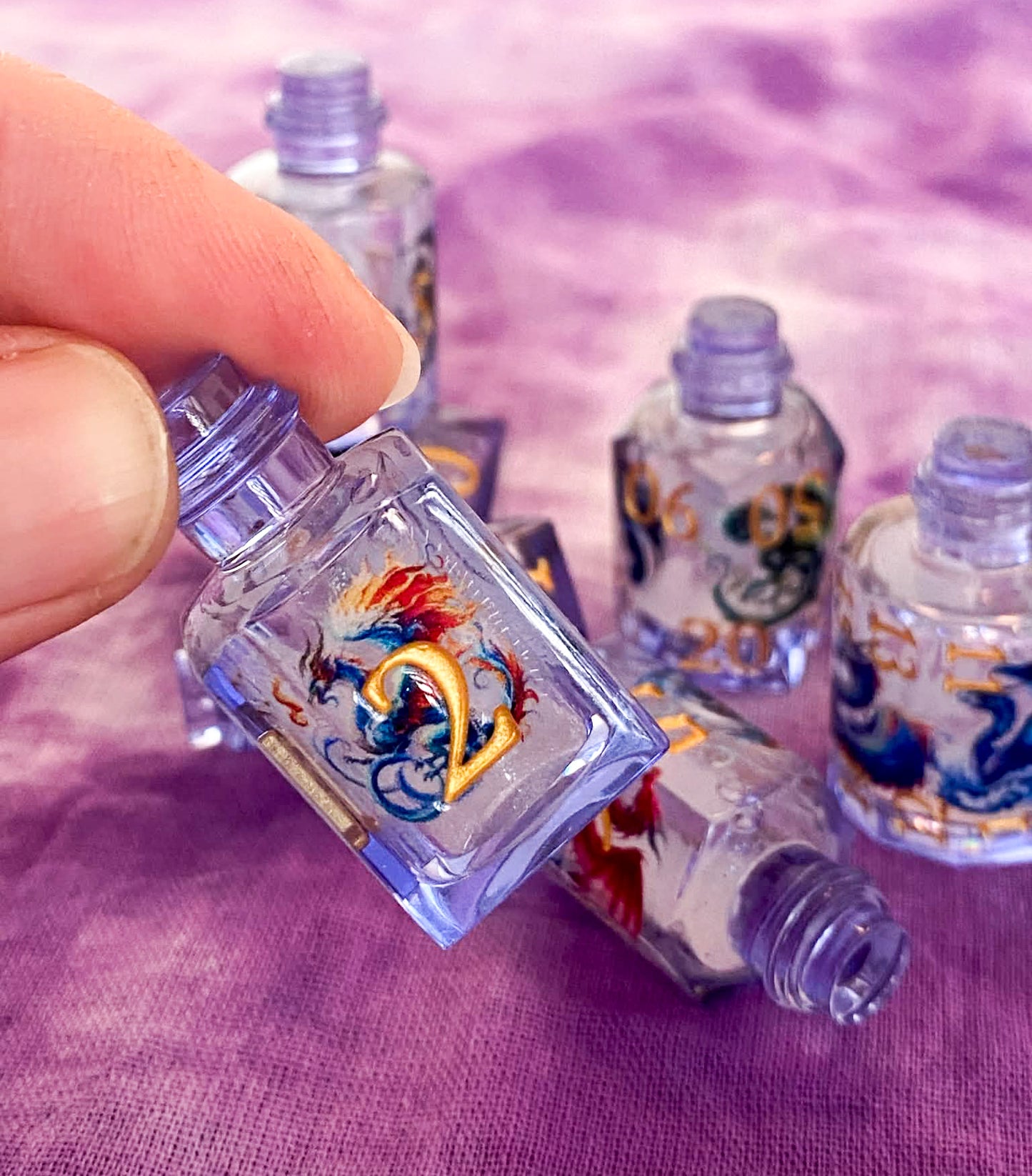 Dragon's Bane - Glitter Flowing Core Potion Bottles 7 Piece Dice Set - DnD Dice, Dungeons and Dragons, TTRPGs