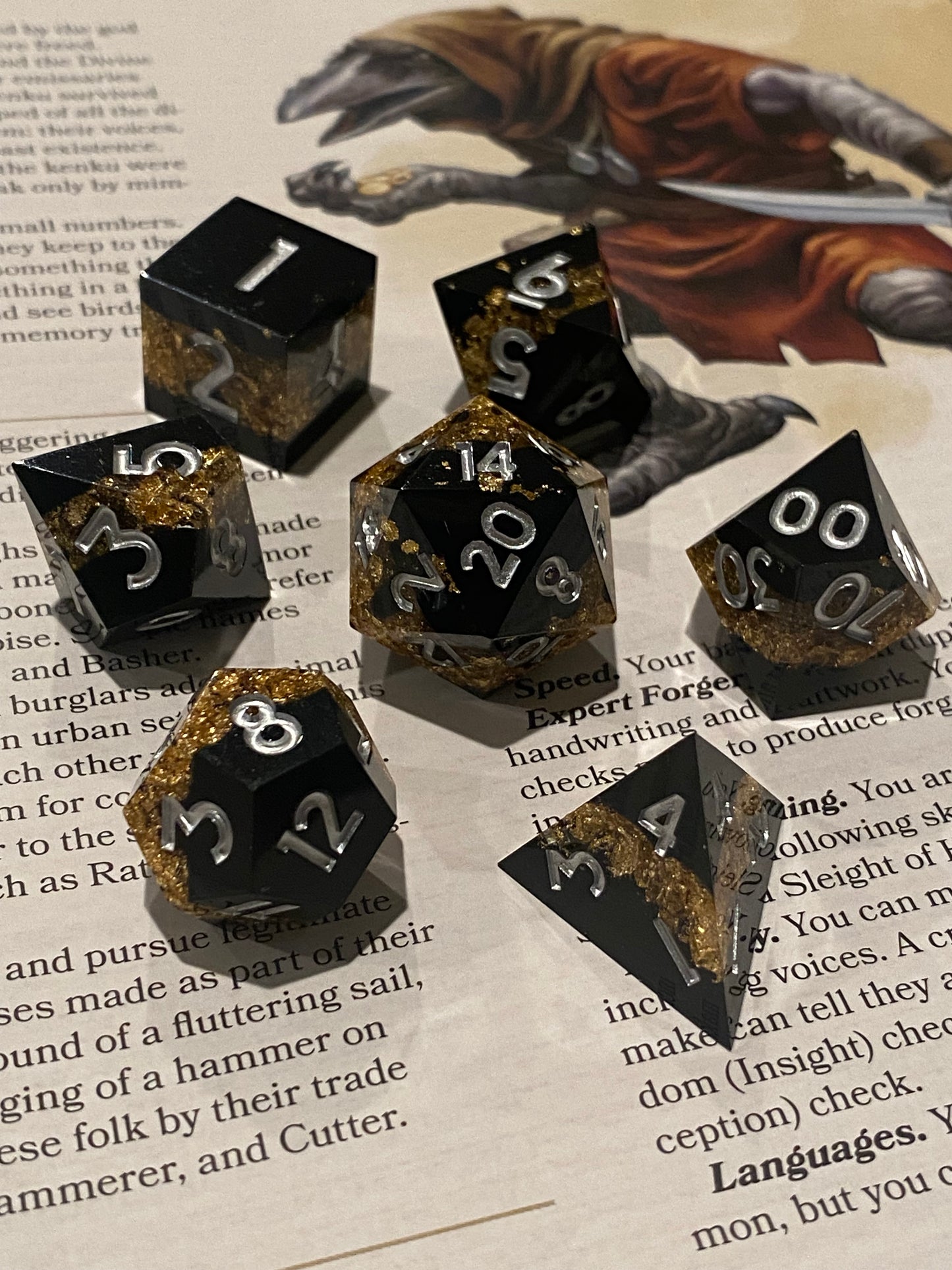 Alchemy: Glittering Layered Sharp Edge Dice Set - 7 Piece - Obsidian Black With Gold Glitter Inclusions