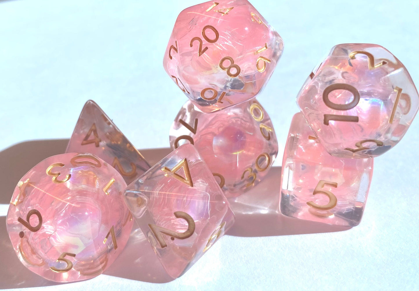 Levitate - Clear Resin 7 Piece Dice Set - Iridescent And Shining Pink Flakes Throughout - Gold Ink - Dungeons and Dragons, TTRPGs
