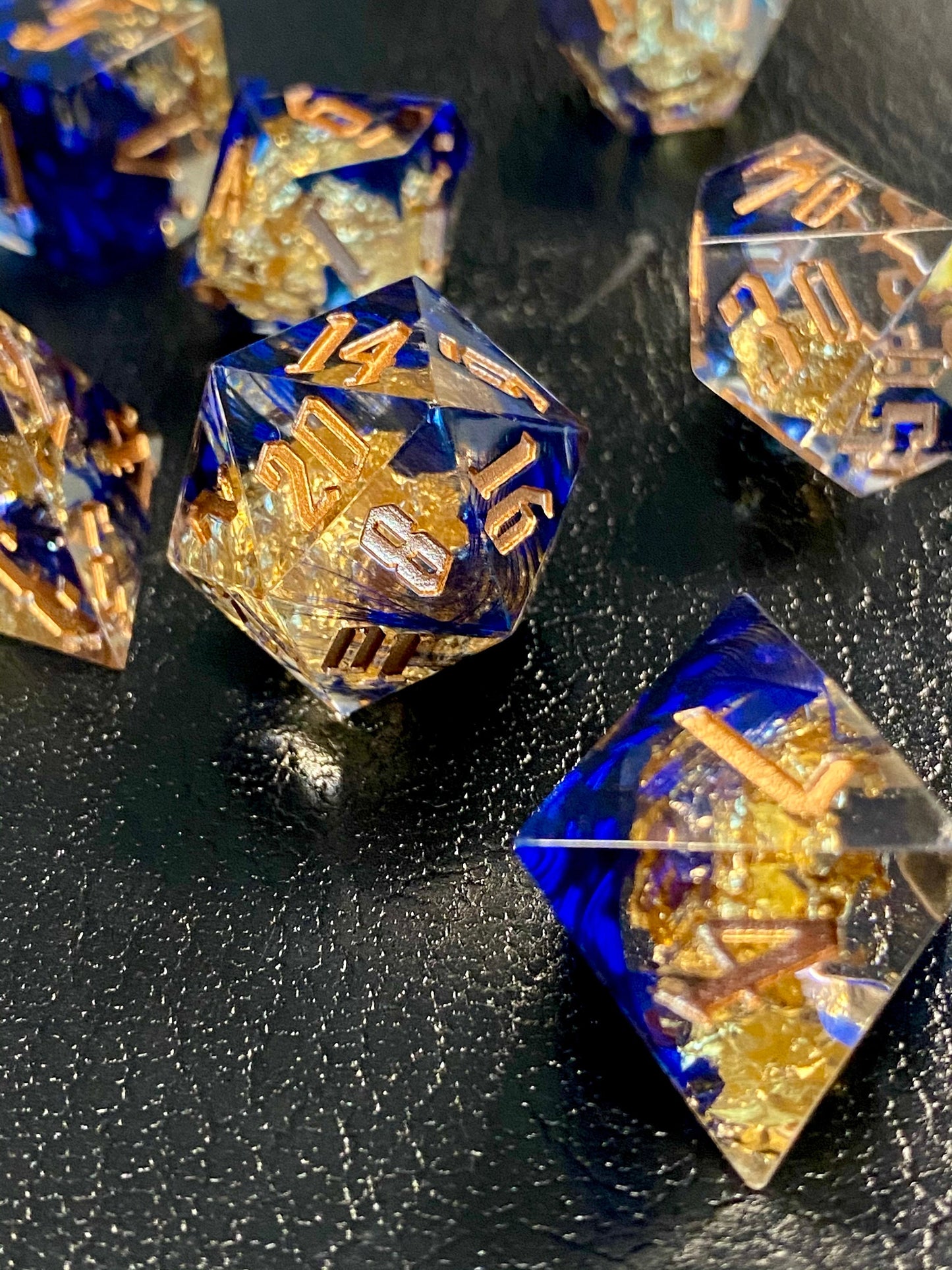 With Wings - Premium Sharp Edge Dice Set- Clear Resin w/ Blue Feathers and Golden Flakes-Gold Ink- Dungeons & Dragons, TTRPGs, Pathfinder