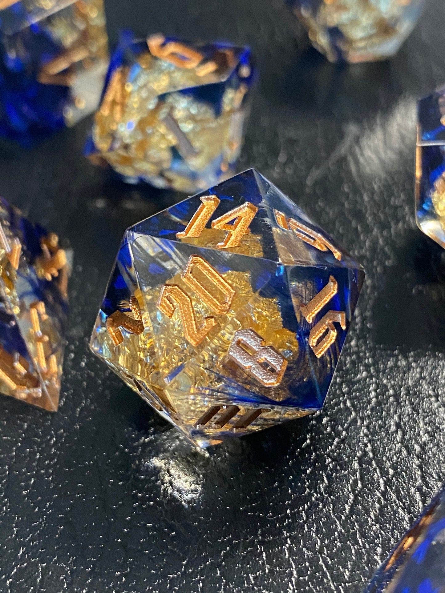 With Wings - Premium Sharp Edge Dice Set- Clear Resin w/ Blue Feathers and Golden Flakes-Gold Ink- Dungeons & Dragons, TTRPGs, Pathfinder